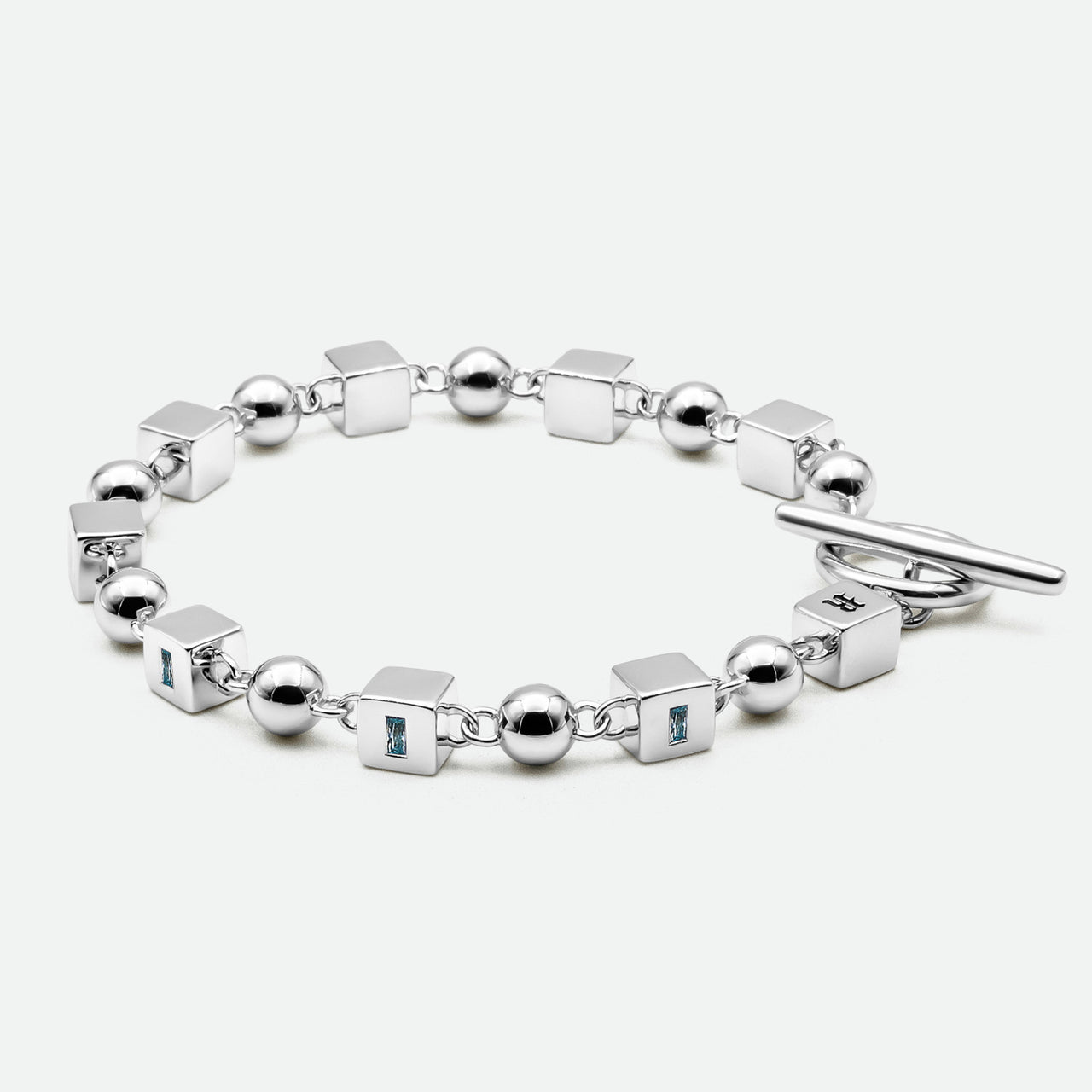 Topaz Bracelet featuring 6mm ball bearings and blue topaz-set cubes