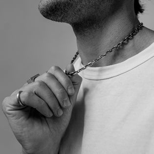  men wearing sterling silver necklace 