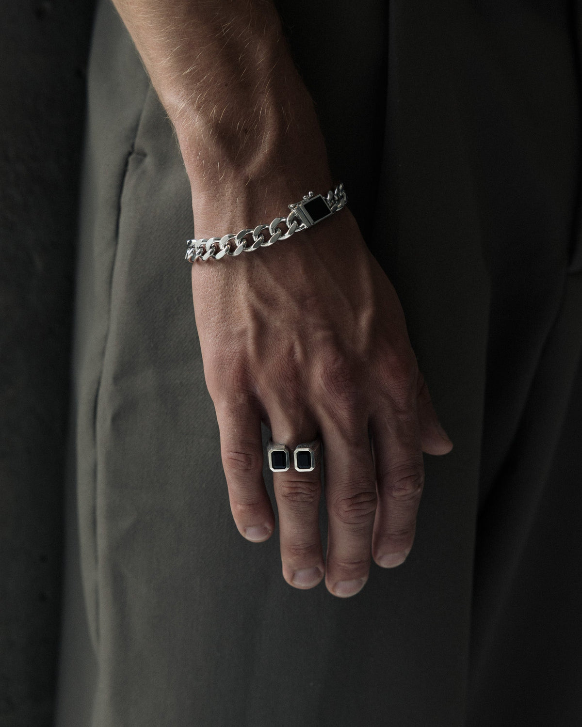 Close-up of the Archie Chain polished sterling silver links and custom clasp.