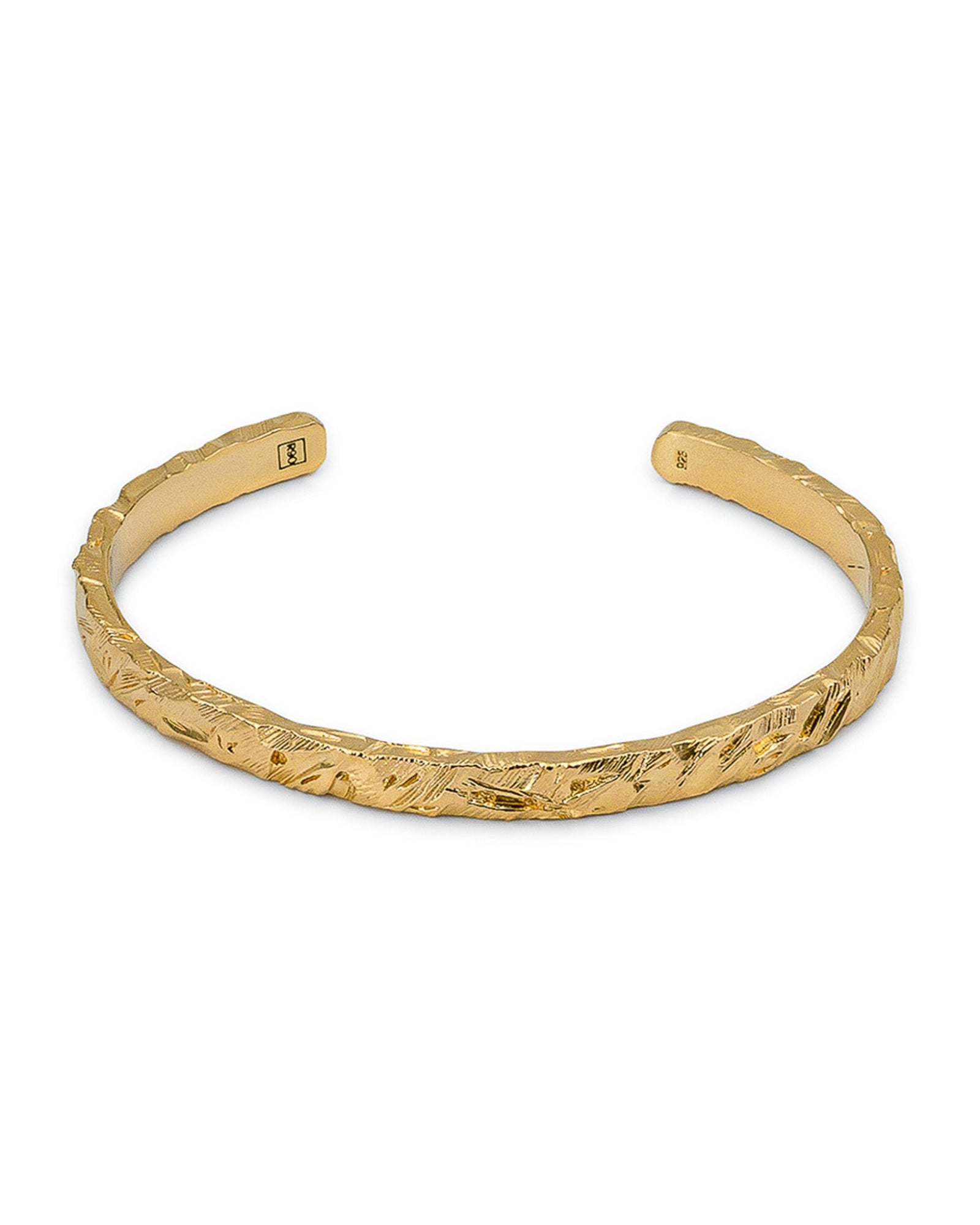 Close-up of the Jasper cuff's textured gold finish