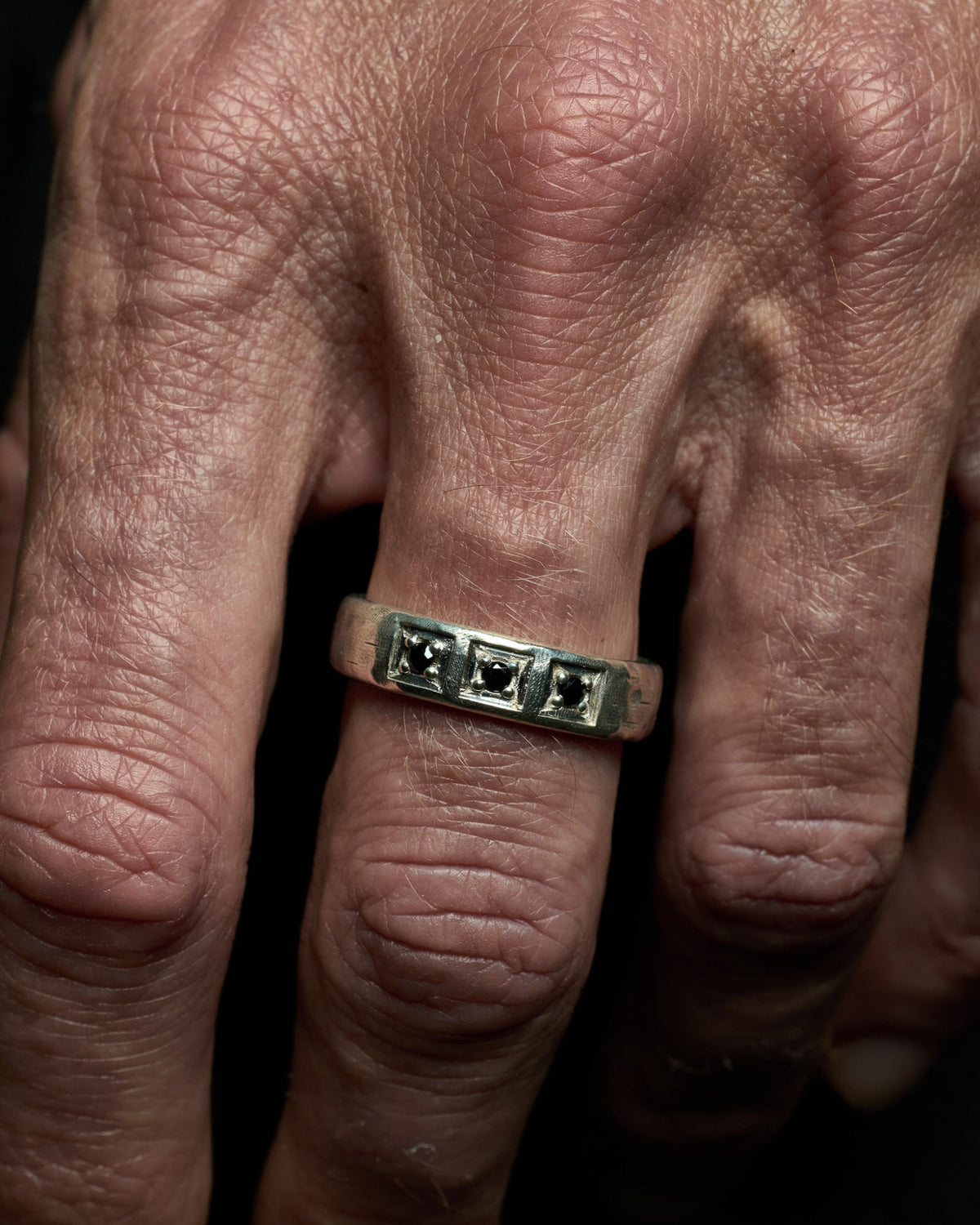 Close-up of the Trilogy Ring featuring genuine black onyx set in solid 925 sterling silver.