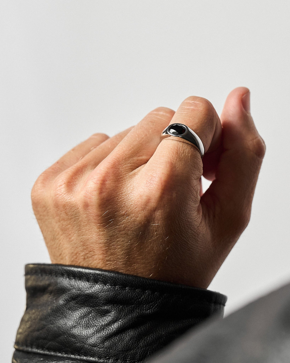 Model wearing the Yuki Black Onyx Ring handcrafted from solid 925 sterling silver featuring genuine black onyx.